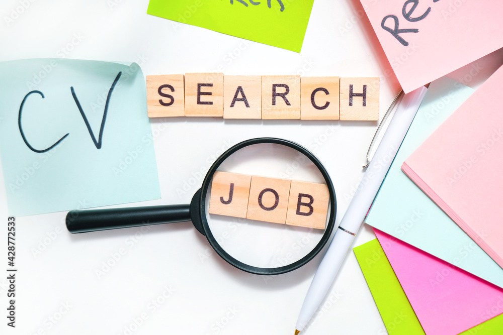 job search concept. Job search lettering on the table, many lettering sheets job search concept. Job search lettering on the table, many lettering sheets