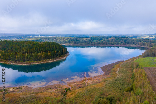 Drones panorama over the autumnal hammer lake in the bavarian forest like in little canada