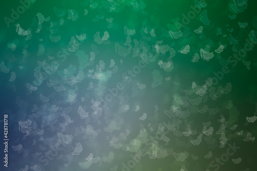 Abstract bokeh background on cat pattern with gradient of green.