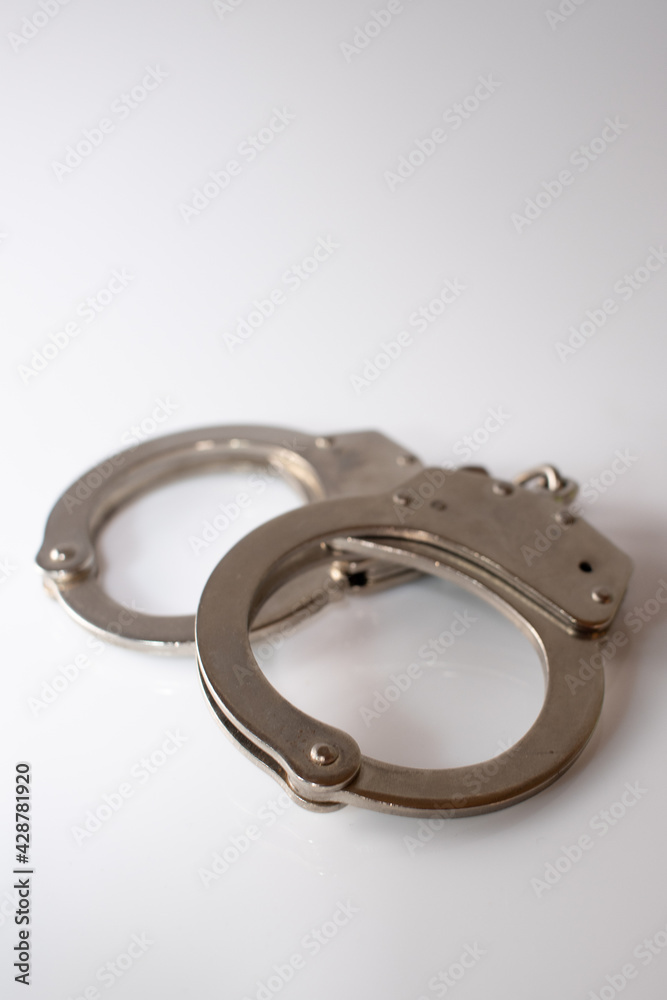Handcuffs on white background isolate