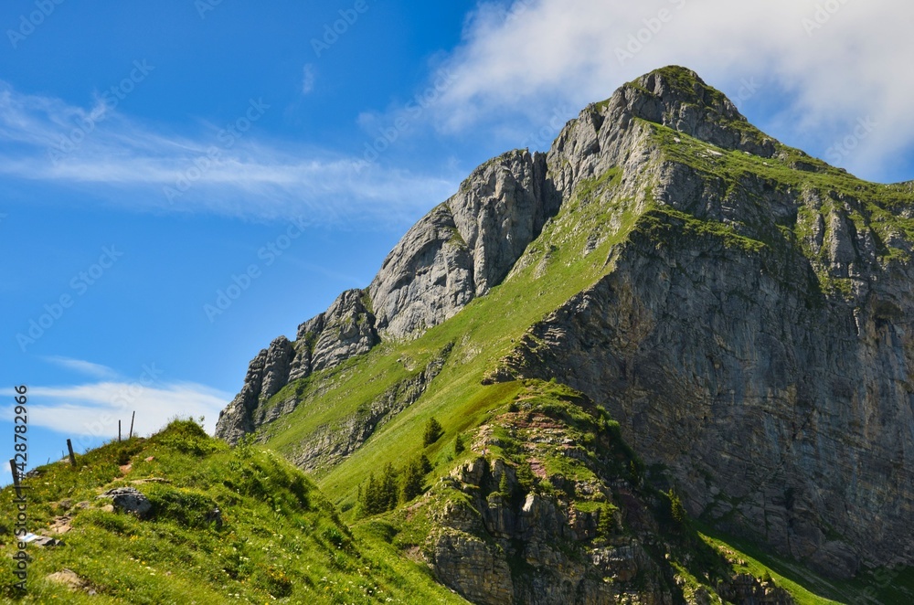 hike to the fronalpstock above mollis in the glarus mountains. Ascent to the summit through the couloir. landscape swiss hike to the fronalpstock above mollis in the glarus mountains. Ascent to the summit through the couloir. landscape swiss