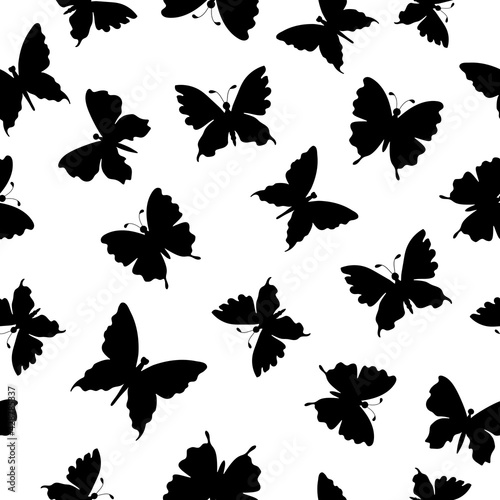 Black silhouettes of butterflies on a white background. Insects. Seamless doodle summer pattern. Suitable for packaging, textile, wallpaper.