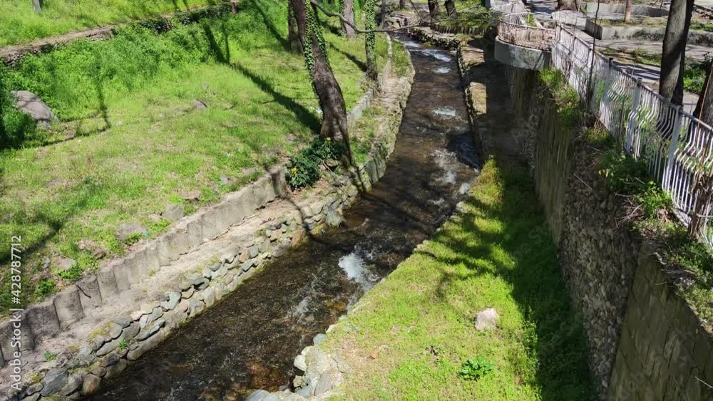 Spring view of Crazy Mary River passing through the town of Petrich, Bulgaria Spring view of Crazy Mary River passing through the town of Petrich, Bulgaria