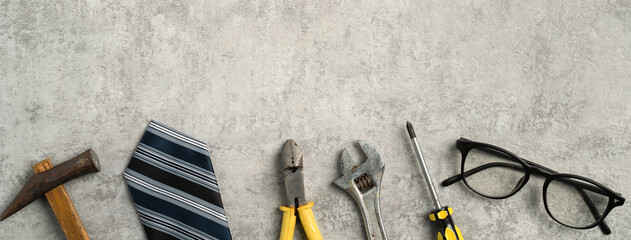 Top view design concept of Father's day with working tools on blue background.