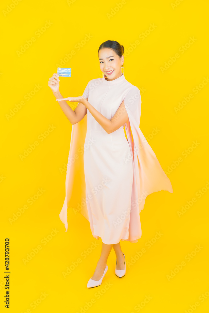 Portrait beautiful young asian woman with credit card and shopping bag Portrait beautiful young asian woman with credit card and shopping bag