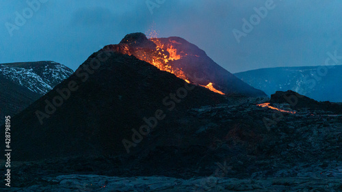 GELDINGADALUR, ICELAND. Erupting Fagradalsfjall volcano at night, 52 km from Reykjavík. View of the eruption in the Reykjanes peninsula. 