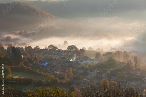 The Cotswold village of Uley, near Stroud, valley and hillsides. photo