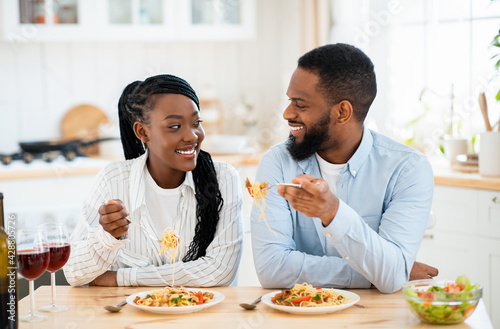 Cheerful African American Lovers Having Romantic Lunch At Home