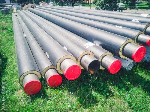 Modern polypropylene pipes for conducting heating mains underground. Close-up photo during sewer construction works. water pipes, drainage system