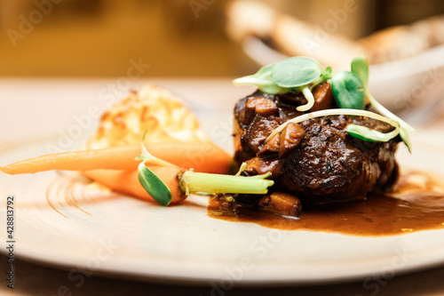 Canvas-taulu Grilled Angus beef tenderloin steak with honey glazed baby carrots, duchess pota