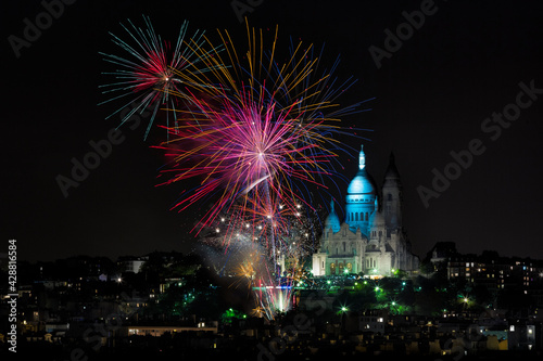 Firework display at The Basilica of the Sacred Heart (Sacre Cœur Basilica) during Fete des Vendanges. Montmartre, Paris, France