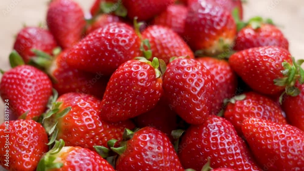 Dish with Ripe Red Strawberries, Close-up. Summer Berries. Strawberries Are Isolated. The Concept of Vegan Food and Vegetarian Diet.