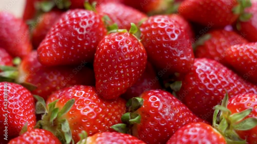 Juicy Sweet Red Strawberries, Summer Berries, Close-up, Rotation. Background of Ripe Strawberries. Healthy Vegetarian Food, Fruit.