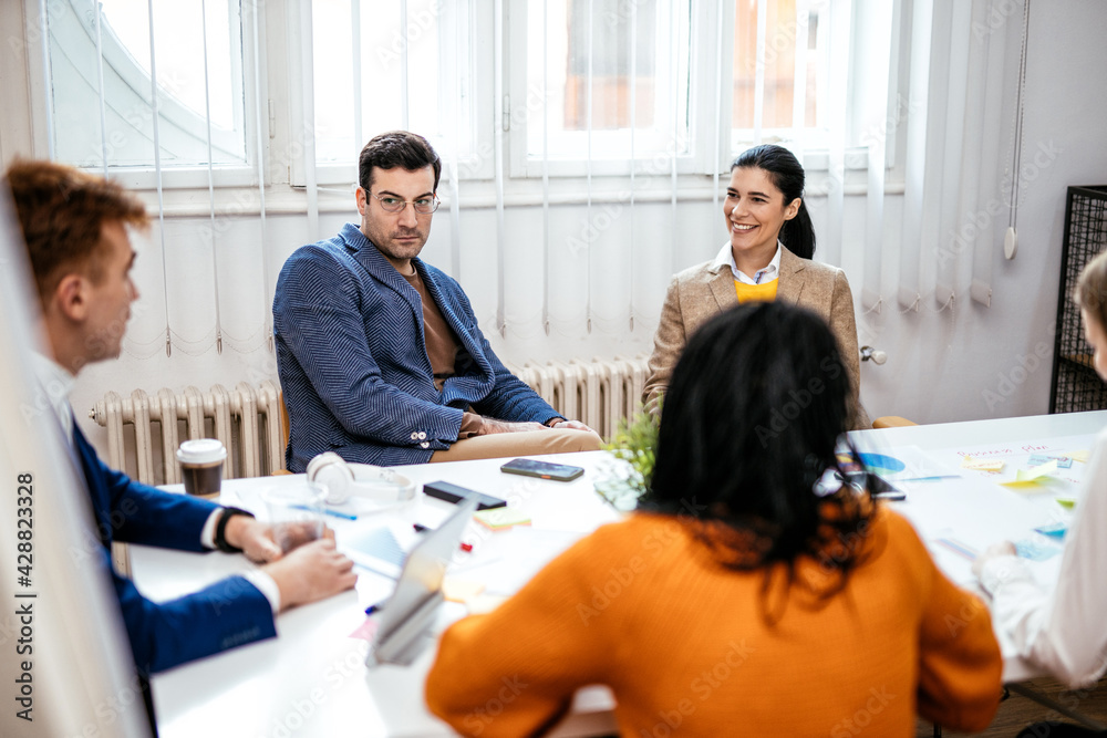 Fototapeta premium Cinematic image of employers working in a start up business