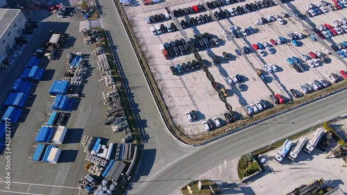 Drone flying above a lot of new cars