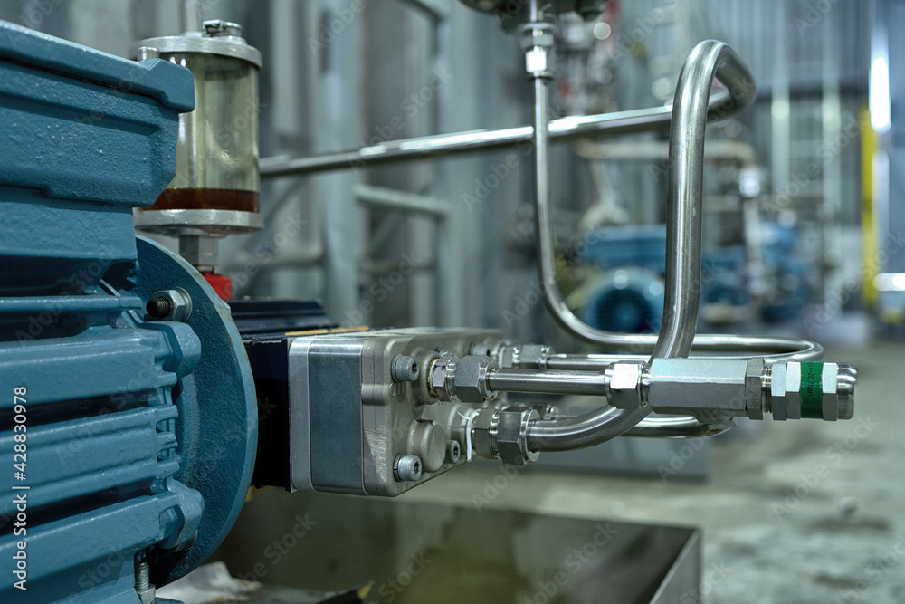 Foto Stock Detail of electric motor with hydraulic, piston pump and