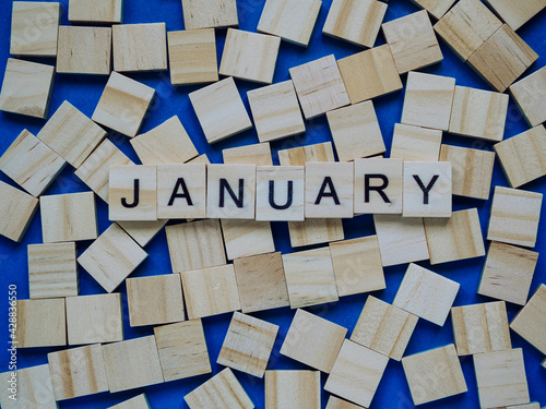 Word January on wooden cubes with copy space. Season concept