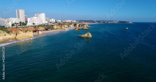 Scenic aerial view of the coastline near the Praia da Rocha (Rocha Beach) in Portimao, Algarve, Portugal