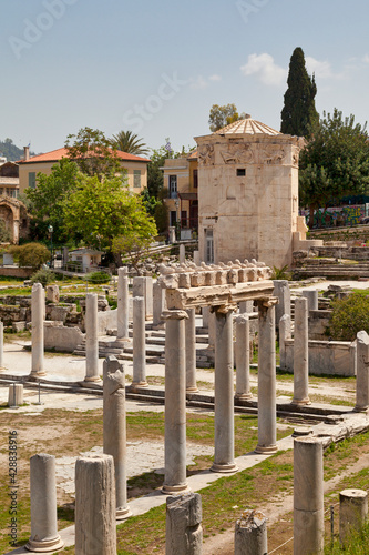 The Horologion of Andronikos Of Kyrrhos in the middle of the ruins of the Roman forum in Athens, Greece photo