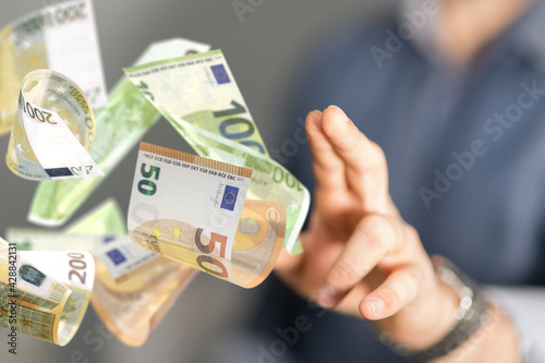 bill euro banknote in hand rain