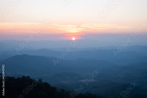 sunrise over the mountains © Nattanon
