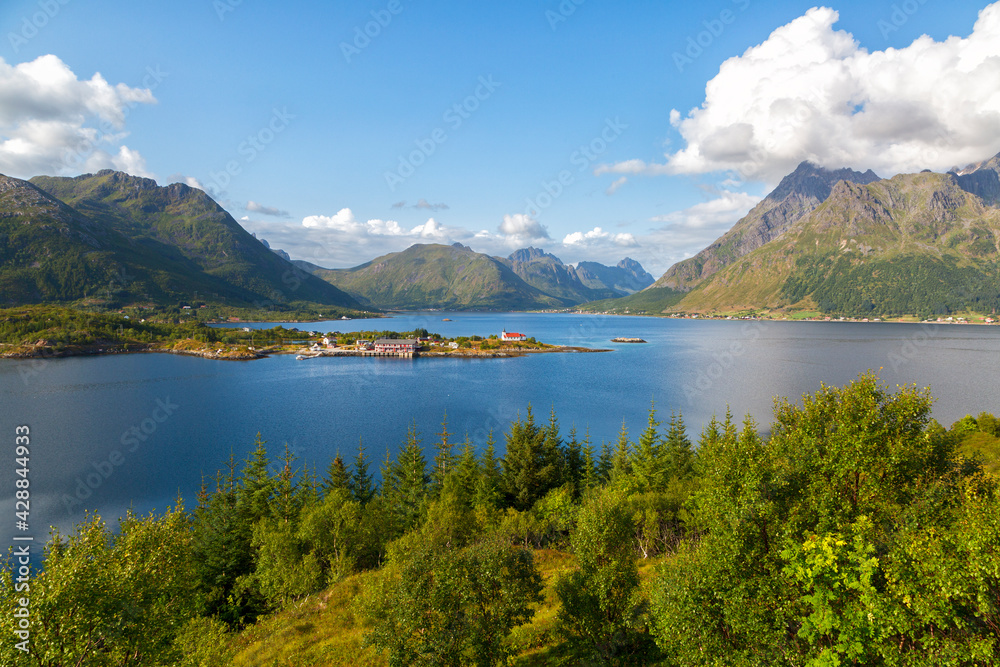 Beautiful Norwegian landscape with a lake and mountains in summer day