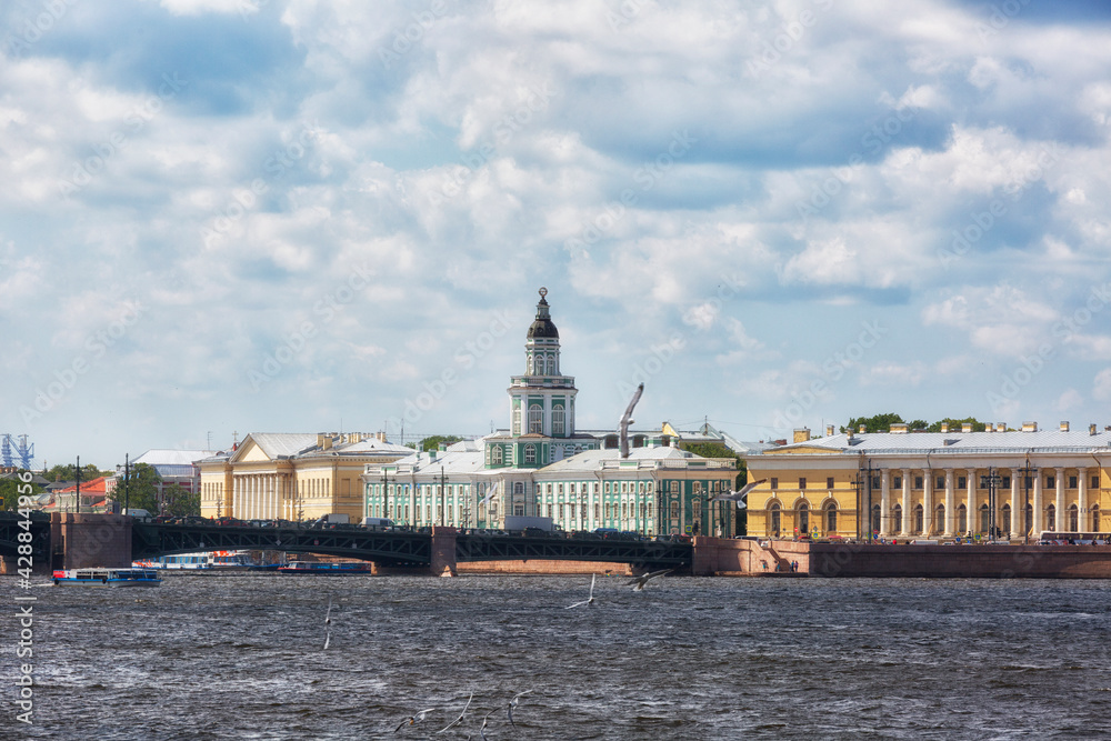 building of the Kunstkammer in St. Petersburg against the sky with clouds, Russia