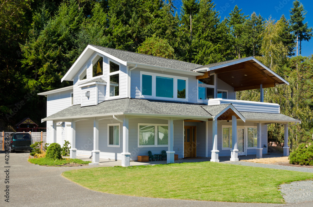 Luxury house at sunny day in Vancouver, Canada. Luxury house at sunny day in Vancouver, Canada.