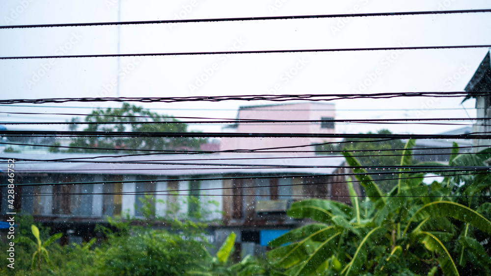 The rain that falls on the wires in the rainy season Thailand