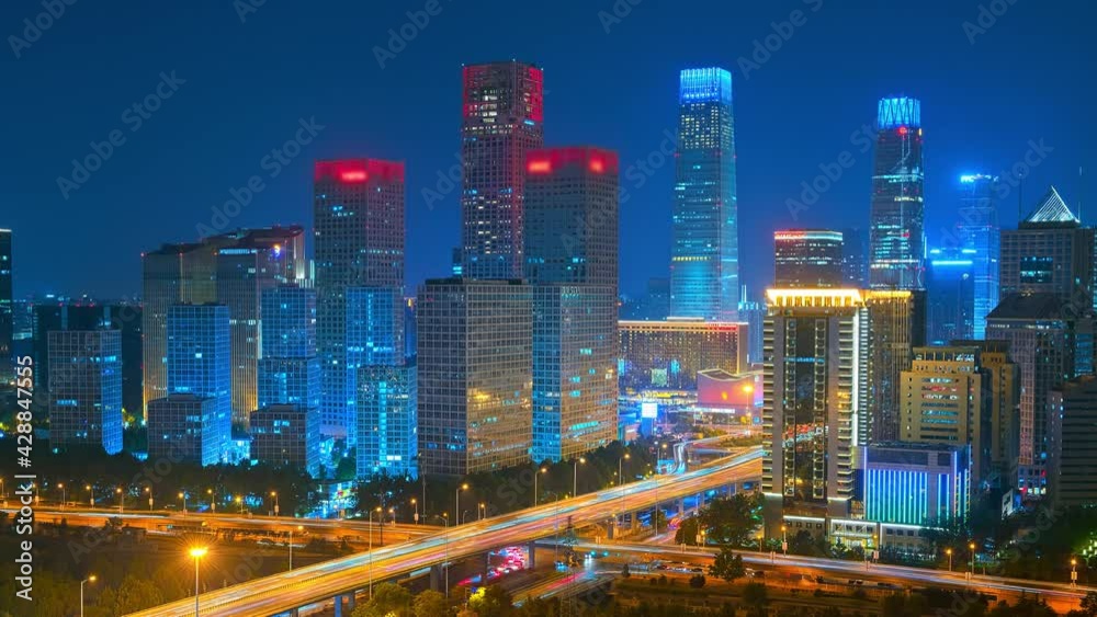 Time-lapse of shining lights on Chinese skyscrapers and busy roads at night Time-lapse of shining lights on Chinese skyscrapers and busy roads at night