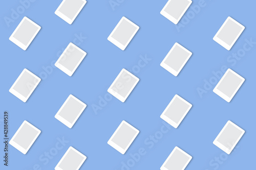 Trendy technological pattern made with white e-book on bright light blue background. Illustration