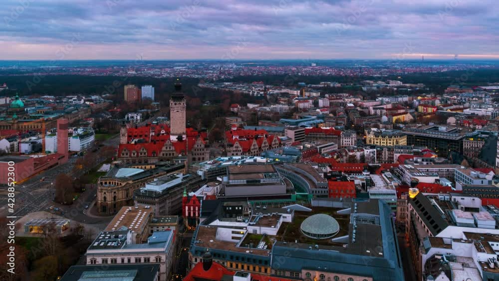 Leipzig, Germany. Aerial view of city center in Leipzig, Germany during the sunset. Main landmarks from day to night, zoom in