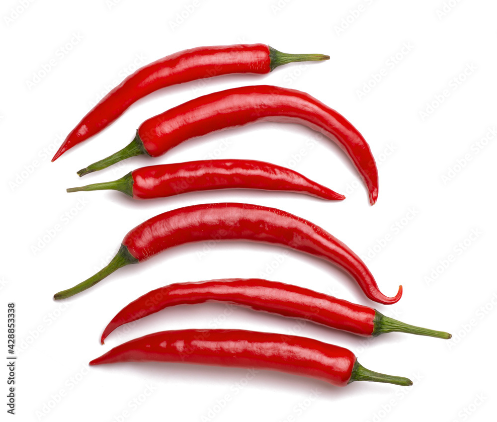 Hot chili pepper whole and slices isolated on white background
