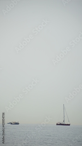 boat on the sea in horizon