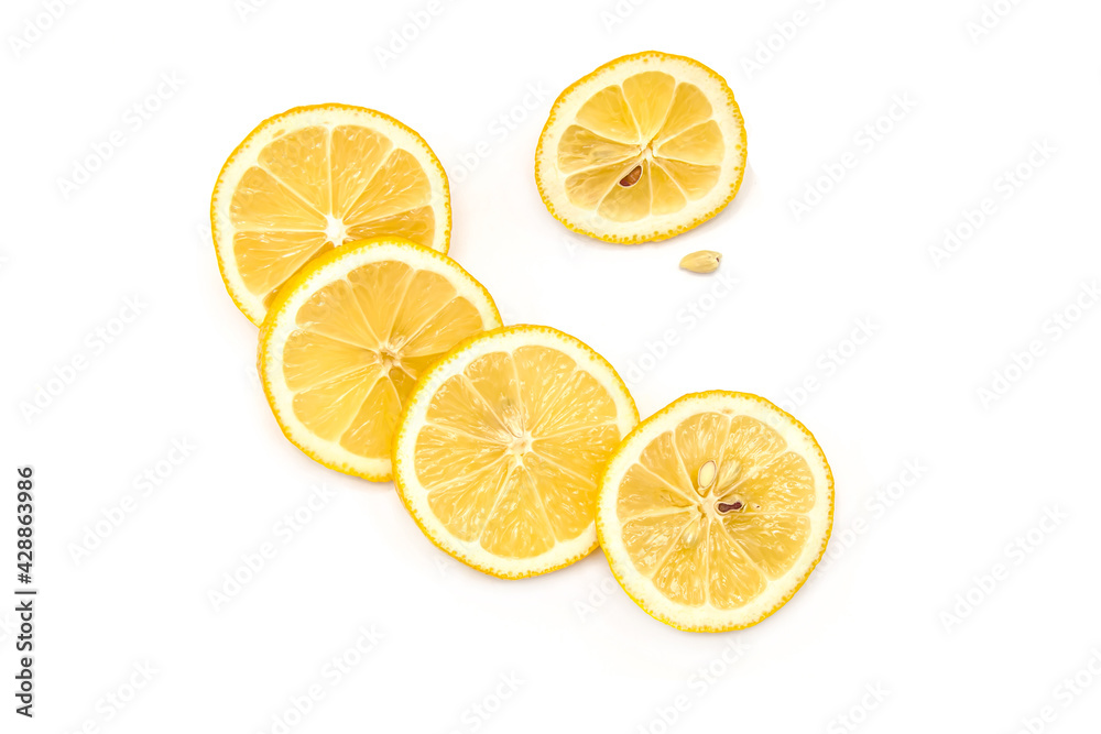 Bright ripe sliced lemon isolated on white background.