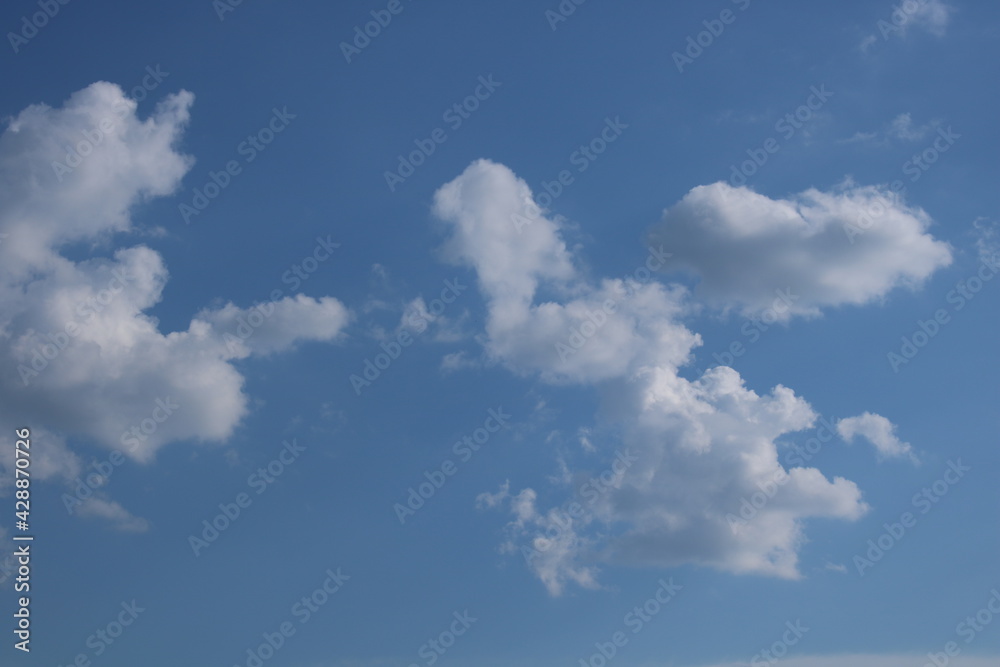 Clouds on a blue background with white clouds. Clouds on a blue background with white clouds.