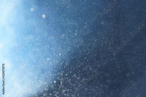 Background with blurred drops and gradient from blue to blue