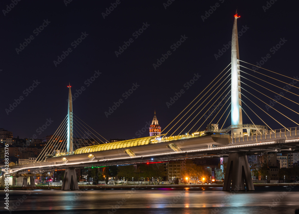 Fototapeta premium Metro bridge across the Golden Horn at night, Istanbul, Turkey