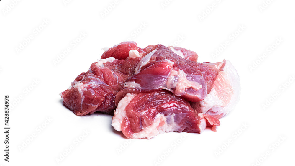 Pieces of raw pork isolated on a white background.
