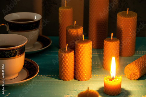Decorative Easter candles made of beeswax with a honey aroma for interior and tradition burning on the table.