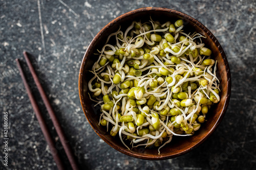 Sprouted green mung beans. Mung sprouts in bowl.