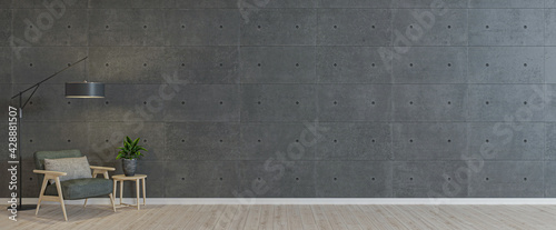 Empty room with armchair on empty dark gray concrete  wall background. Modern minimalist interior with armchair, plant, table and a lamp. 3d rendering.