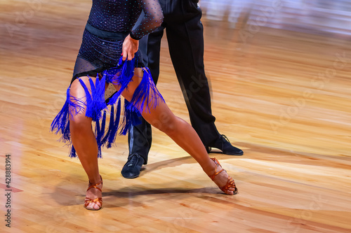 Woman and man dancing latin program. International competition.