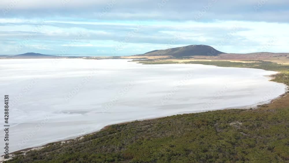 2020 - Excellent aerial shot of the greenery and slopes surrounding the frozen over Lake Greenly in Eyre Peninsula, South Australia. 2020 - Excellent aerial shot of the greenery and slopes surrounding the frozen over Lake Greenly in Eyre Peninsula, South Australia.