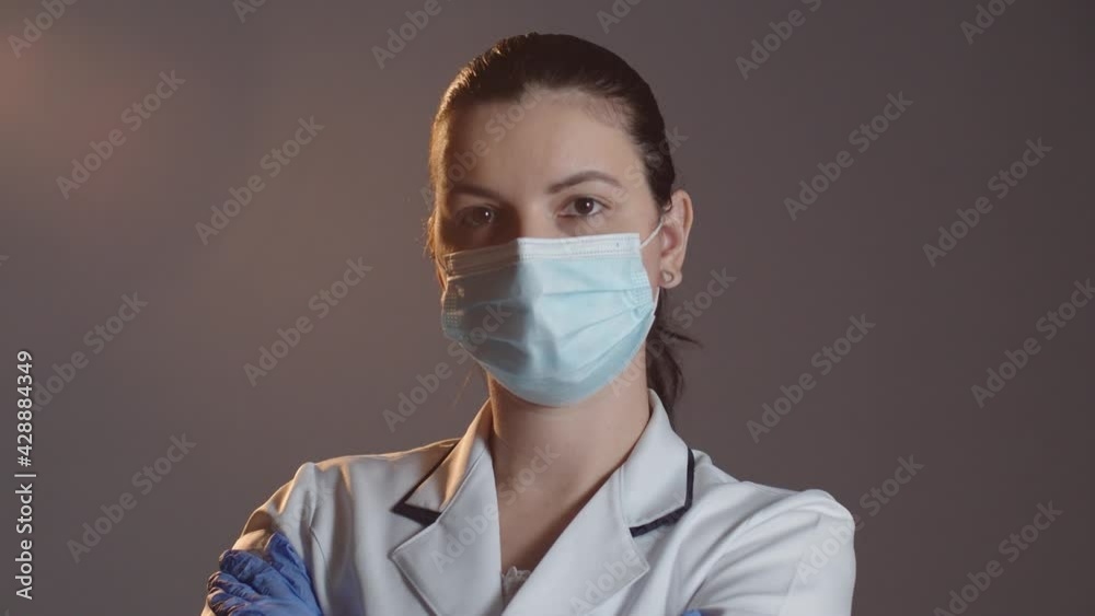 Portrait of female nurse or doctor wearing mask Portrait of female nurse or doctor wearing mask