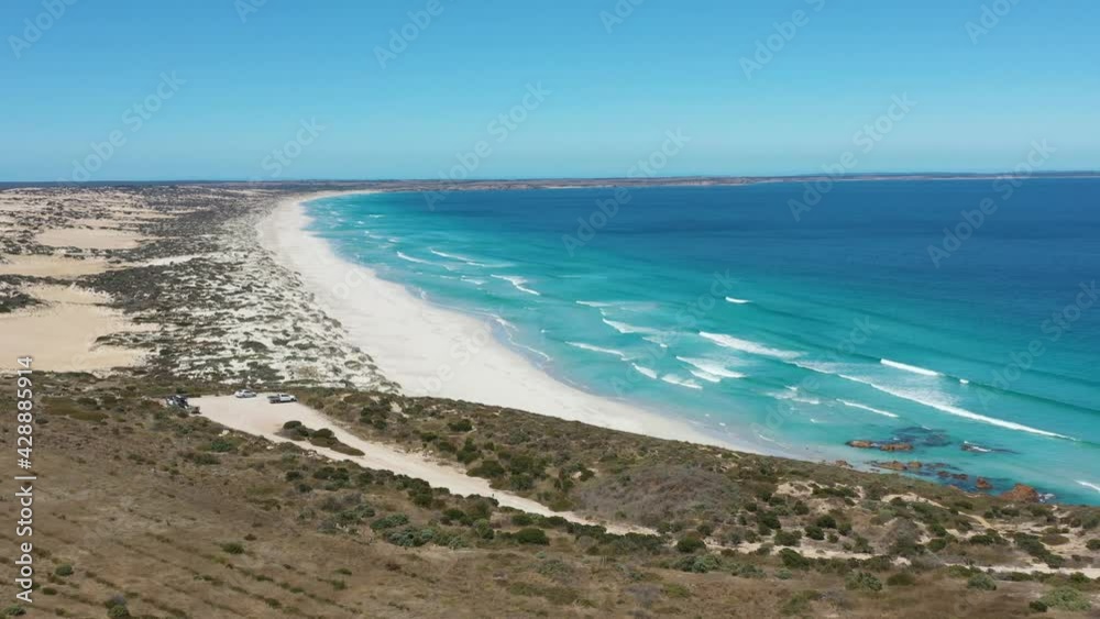 2020 - Excellent aerial shot of blue waves lapping the white shoreline of Daly Head on Yorke Peninsula, Australia. 2020 - Excellent aerial shot of blue waves lapping the white shoreline of Daly Head on Yorke Peninsula, Australia.