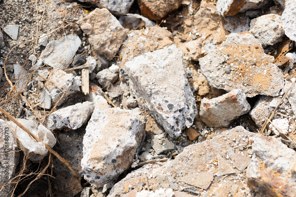 The consequences of the earthquake. Large concrete blocks crushed. Remains of a building with rebar. The consequences of the earthquake. Large concrete blocks crushed. Remains of a building with rebar.