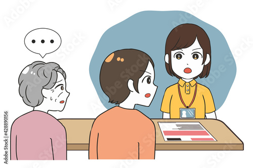込み入った話をする女性介護士と娘　置き去りの祖母