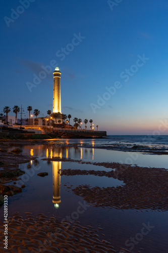 vertical view of the Chipiona lighthouse in Andalusia at sunset