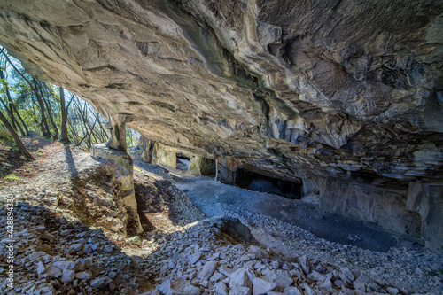 Beautiful Limestone cave, Old Oolitic stone quarries in Massone, The extracted stone, called "statuary stone"Arco, Italy. Bosco Caproni